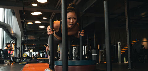 Woman sled push hyrox class bxr city